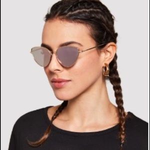 Pink cat eye sunglasses with black & gold details